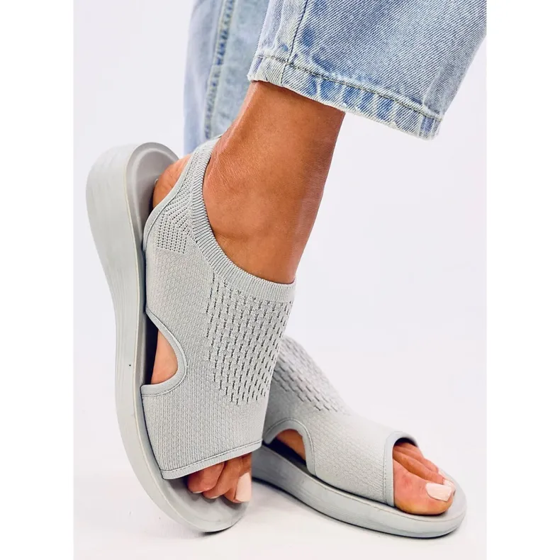 Grey soft cut-out sandals by Aldo.