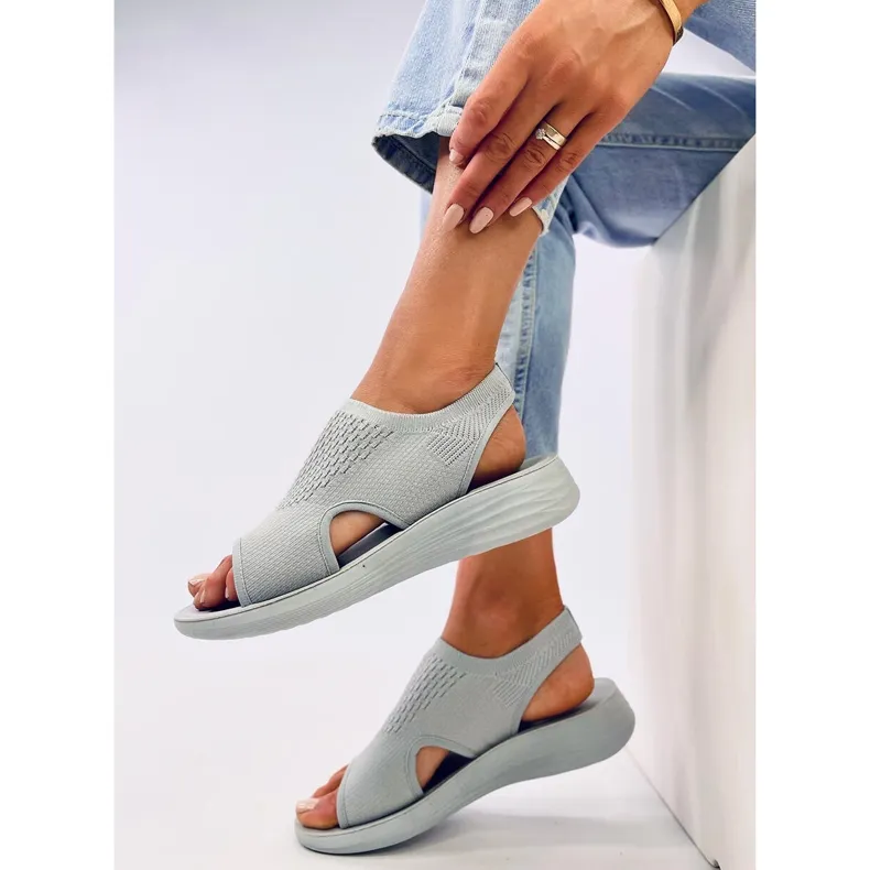 Grey soft cut-out sandals by Aldo.