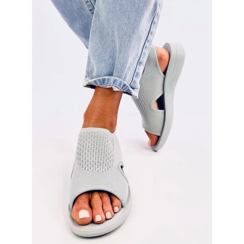 Grey soft cut-out sandals by Aldo.