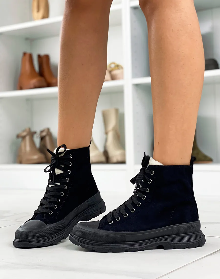 Black suede high-top sneakers with thick sole