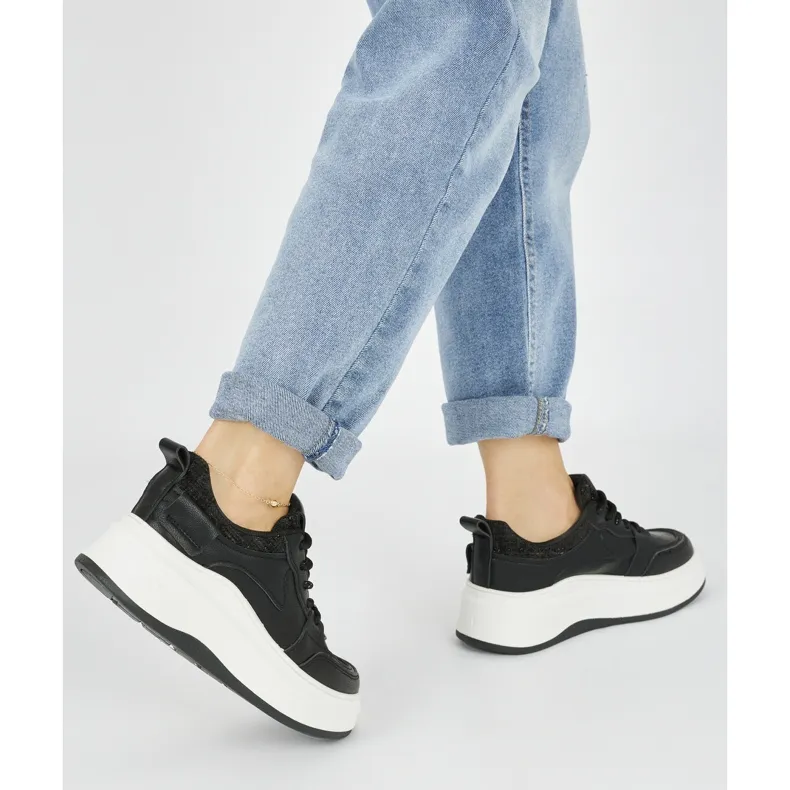 Black women's platform sneakers in black