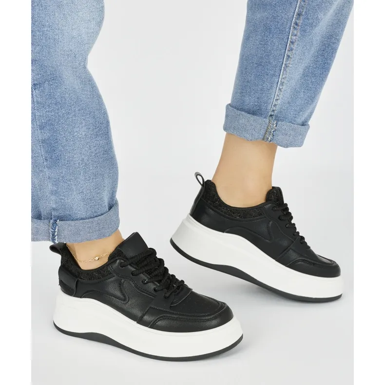 Black women's platform sneakers in black