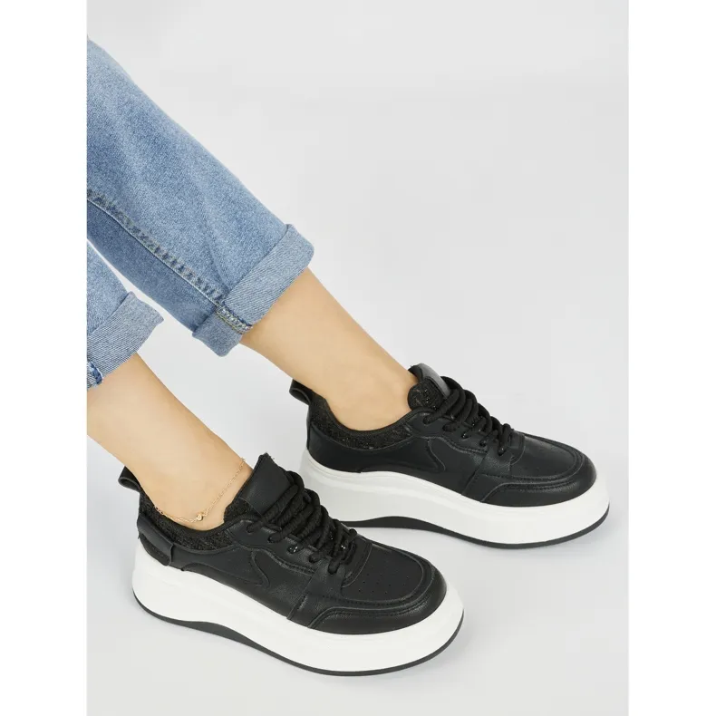 Black women's platform sneakers in black