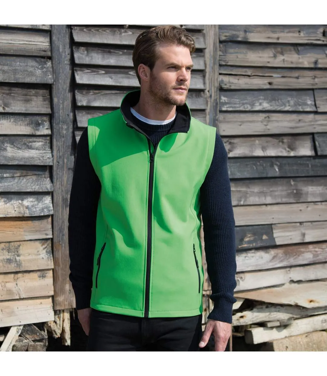 Core men's green/black sleeveless vest.