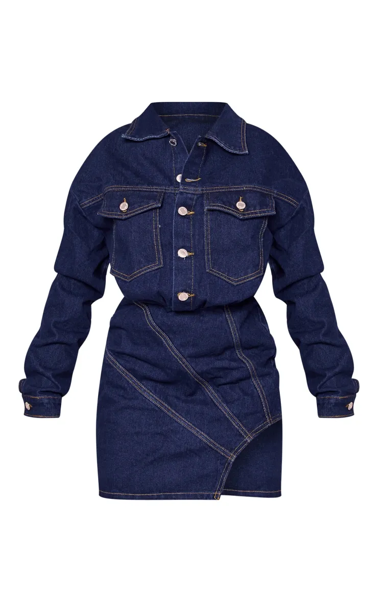 Dress in faded indigo blue denim with curved hem and seam details.