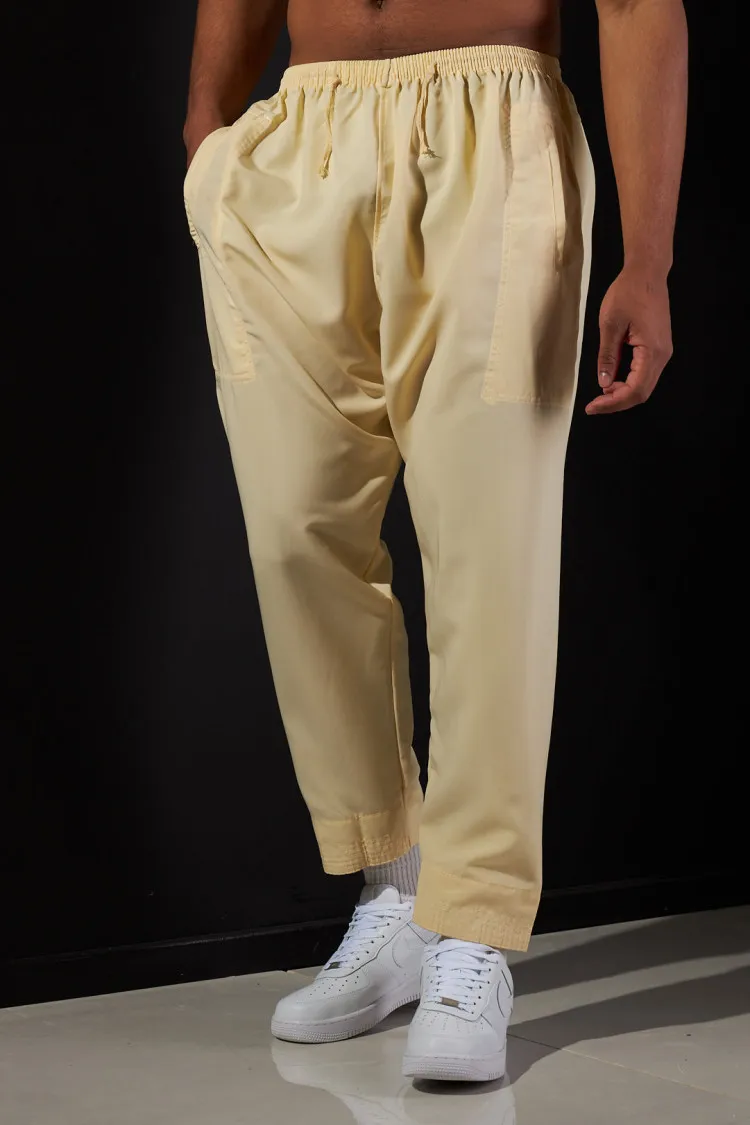 Qamis and Yellow Pants Set.