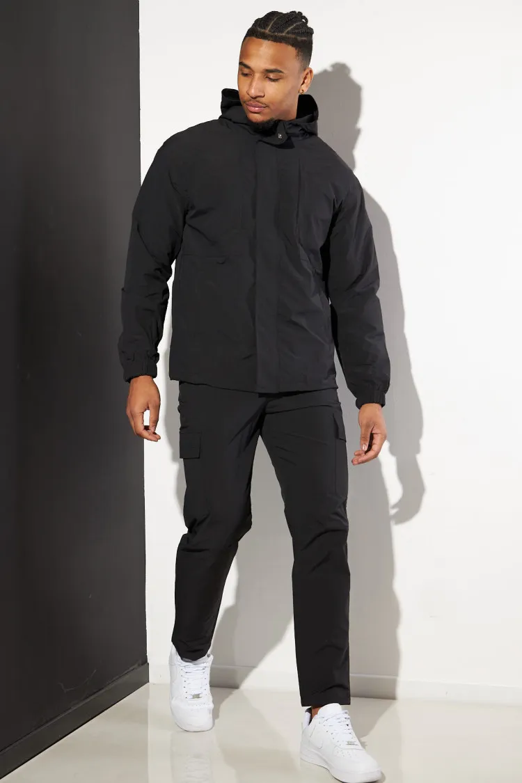 Ensemble noir veste et pantalon à capuche