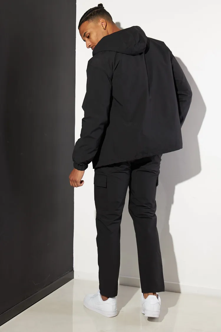 Ensemble noir veste et pantalon à capuche