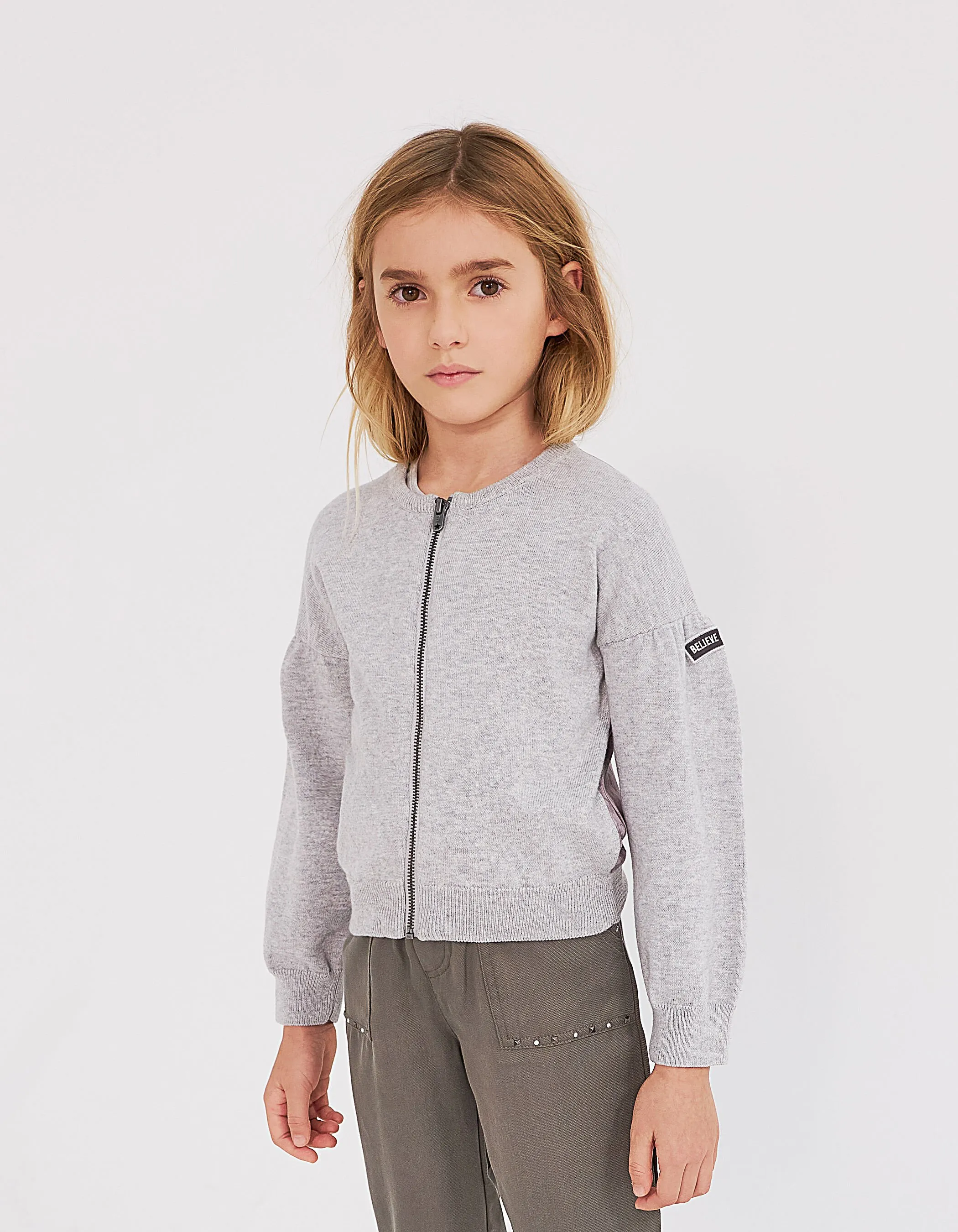 Gray heathered dual-material zip-up cardigan for girls.