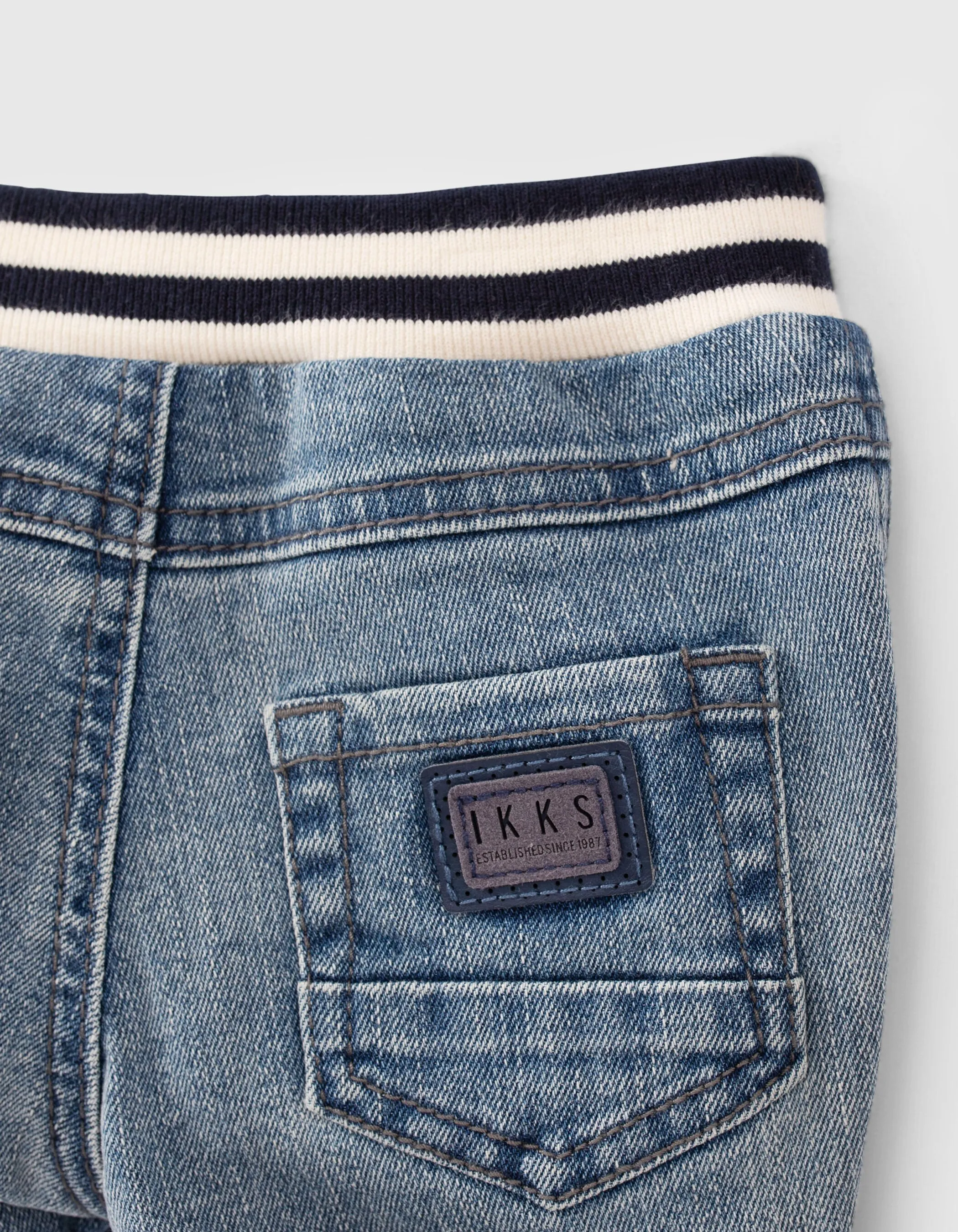 Baby boys' blue jeans and ribbed waistband belt