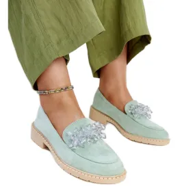 Light green suede moccasins embellished with Zemzem crystals.