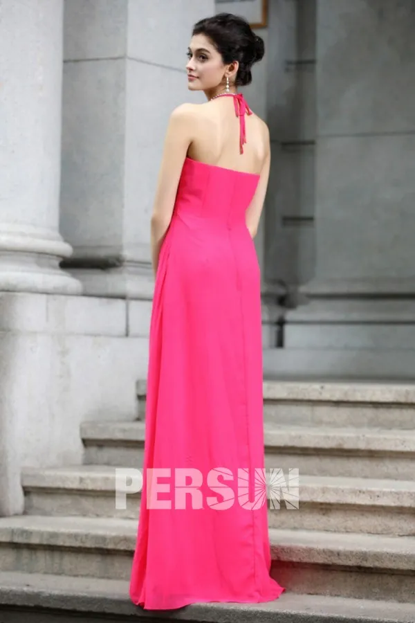 Simple evening gown with thin halter neck strap.