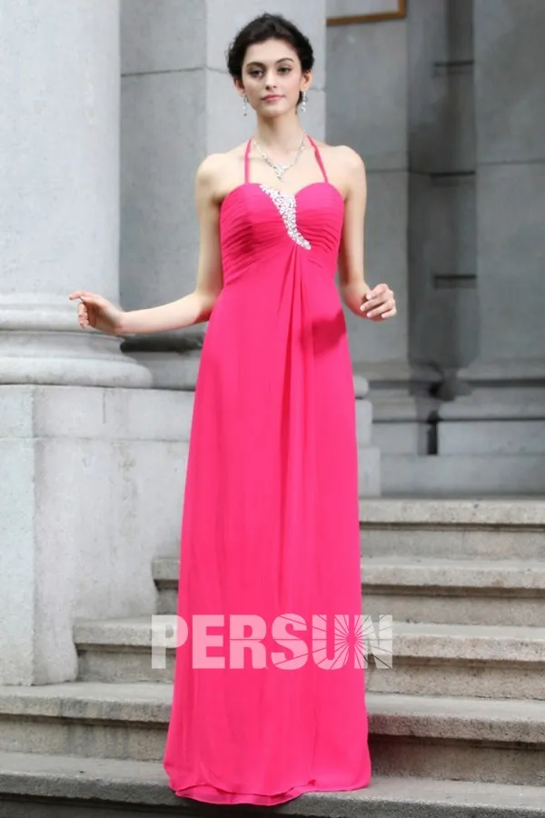 Simple evening gown with thin halter neck strap.