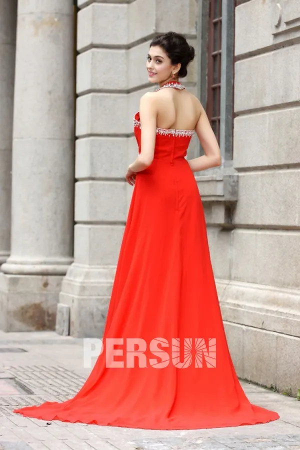 Long red dress with sweetheart neckline and halter strap.