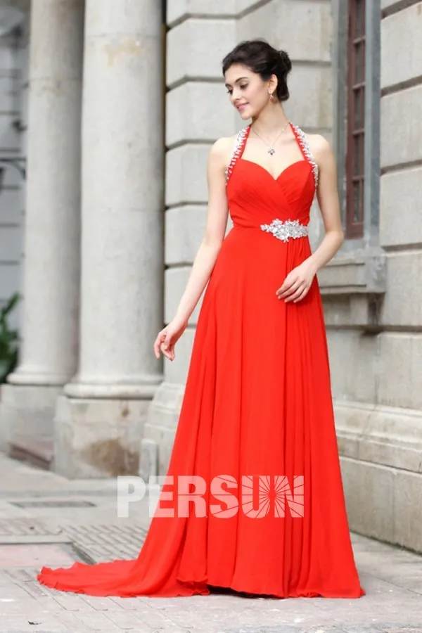 Long red dress with sweetheart neckline and halter strap.