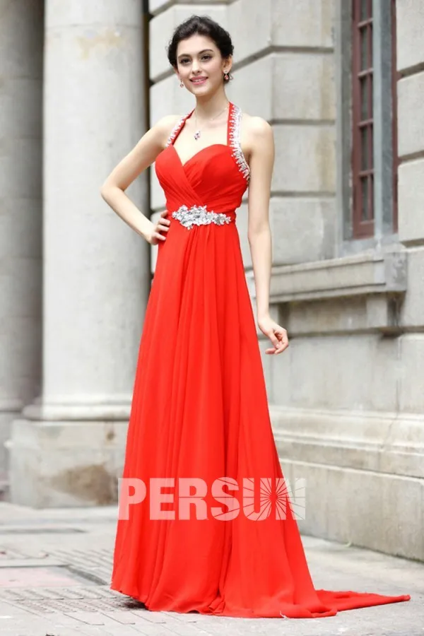 Long red dress with sweetheart neckline and halter strap.