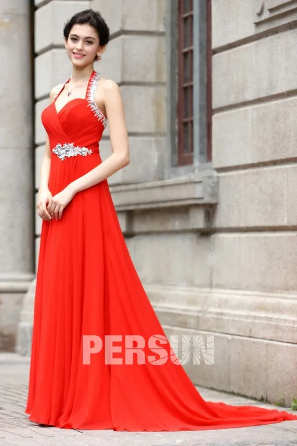 Long red dress with sweetheart neckline and halter strap.