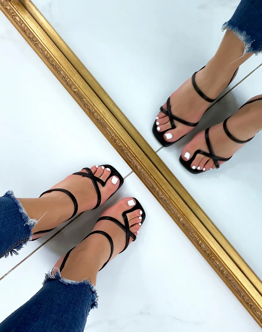 Black strappy thong sandals