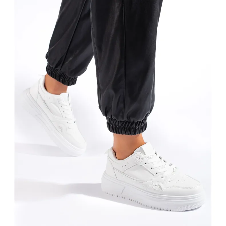 White Women's Athletic Sneakers and Sports Shoes.